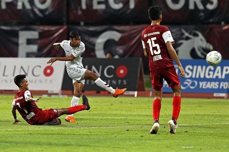 Adam Swandi scoring the final goal in Albirex Niigata's 6-1 Singapore Premier League victory against Home United at Bishan Stadium yesterday.
