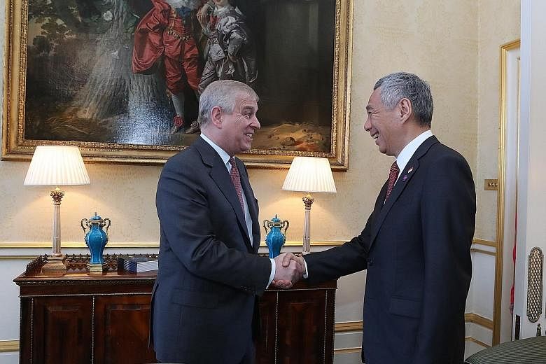 Prime Minister Lee Hsien Loong meeting Britain's Prince Andrew in London yesterday on the sidelines of the Commonwealth Heads of Government Meeting.