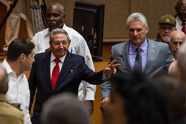 Outgoing Cuban President Raul Castro (left) and First Vice-President Miguel Diaz-Canel are shown arriving at the National Assembly yesterday in a photo by official Cuban website www.cubadebate.cu.