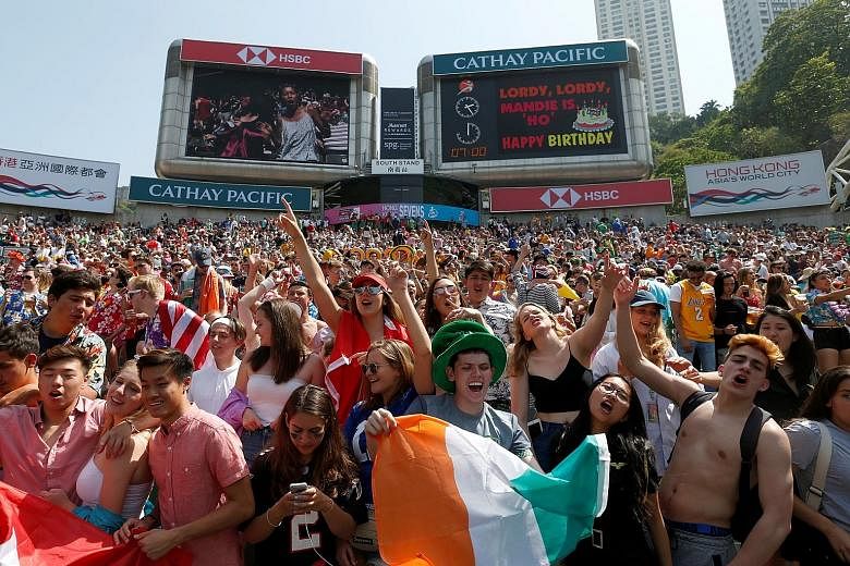 Fans in the south stand of the Hong Kong Stadium singing in unison during the Hong Kong leg of the World Rugby Sevens Series earlier this month. World Rugby chief executive Brett Gosper says the HSBC Singapore Rugby Sevens has the potential to match 