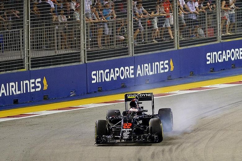 Jenson Button during the first practice session of the 2016 Formula One Singapore Airlines Singapore Grand Prix. SIA first came on board as title sponsor of the night race in 2014. The airline has never revealed the price tag for the deal, but it is 