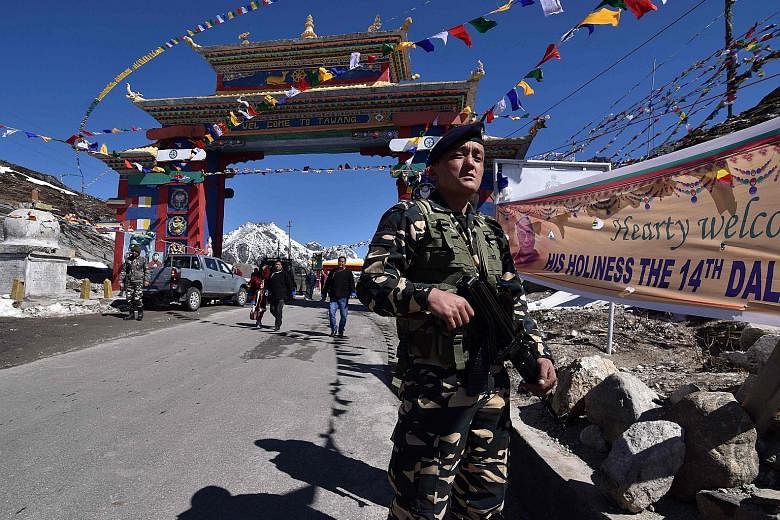 An Indian security guard near the Chinese border in India's north-eastern state of Arunachal Pradesh. India and China have had longstanding issues along their nearly 4,000km-long border, which is poorly demarcated in many parts. Border rows flare up 