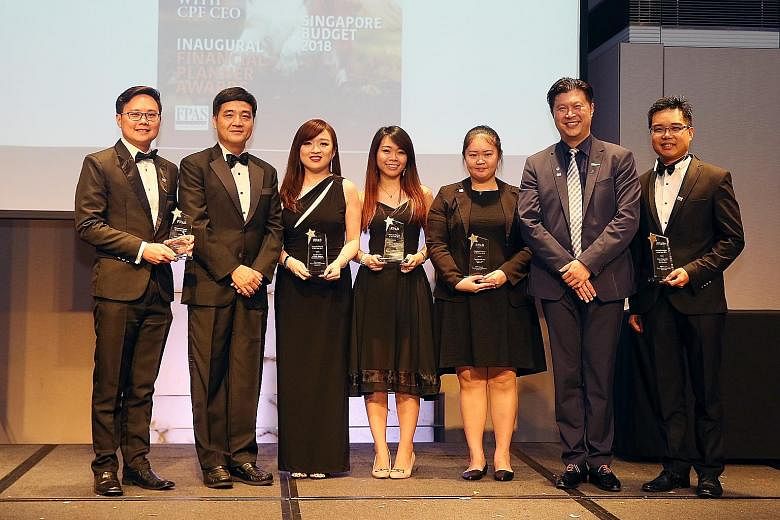 The winners of the Financial Planning Association of Singapore (FPAS) Financial Planner Awards include (from left) Mr Colin Lai (financial advisory - rising star), Ms Goh Ming Shan (insurance - rising star), Ms Kaylyn Heng (banking - rising star), Ms
