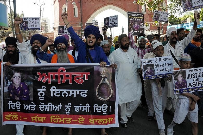 Members of Sikh and Muslim organisations shouting slogans during a protest in Amritsar yesterday against the rape of an eight-year-old. Child rights activists and lawyers said the introduction of the death penalty would make no difference because it 