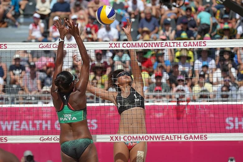 Singapore's Lau Ee Shan spiking the ball against her Vanuatu opponent at the Gold Coast Commonwealth Games. Total body movements like playing beach volleyball are more effective due to the use of large muscle groups.