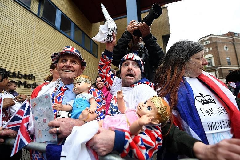 Royal well-wishers outside St Mary's Hospital in London yesterday where the new prince was born.
