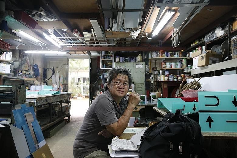 Ms Sior Lili, 23, and her mother, Ms Wong Siew Lin, 61, at their workshop, Sin Keong Air-con and Refrigerator Service, in Geylang East Industrial Complex. Lili helps her mother with administrative work in the office. Mr Loo Theng Hoi of Hup Seng Sign