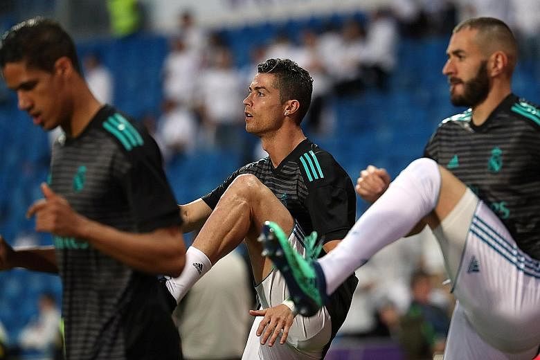 Real Madrid's Cristiano Ronaldo (centre) warming up with Raphael Varane and Karim Benzema before the LaLiga match against Athletic Bilbao last week. Ronaldo scored in the 1-1 draw.