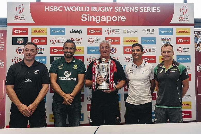 From left: New Zealand coach Clark Laidlaw, South Africa coach Neil Powell, Canada coach Damian McGrath, Fiji coach Gareth Baber and Australia coach Tim Walsh at the launch of the HSBC Singapore Rugby Sevens yesterday. McGrath is hoping fatigue will 