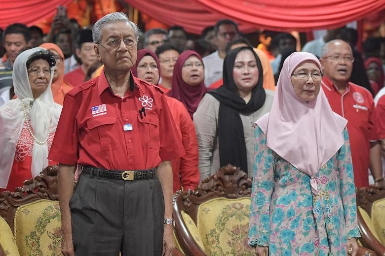 Tun Mahathir Mohamad and Dr Wan Azizah Ismail are leading their respective parties in the opposition coalition against the ruling Barisan Nasional in Malaysia's general election. New rules by the Election Commission will effectively prevent photos of