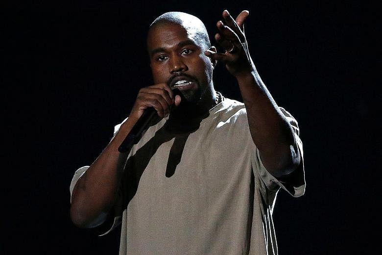 Rapper Kanye West (right) showed his admiration for United States President Donald Trump (left) on Wednesday in a string of tweets, saying that they both have "dragon energy".
