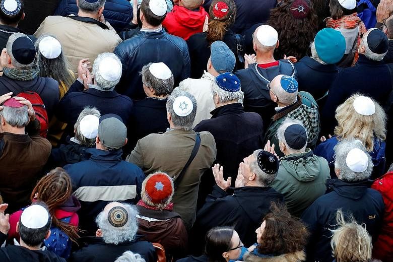 Demonstrators wearing kippas protesting in front of a Jewish synagogue in Berlin on Wednesday to denounce an anti-Semitic attack on a kippa-wearing young man in the capital earlier this month. A spate of shocking anti-Semitic incidents has raised poi
