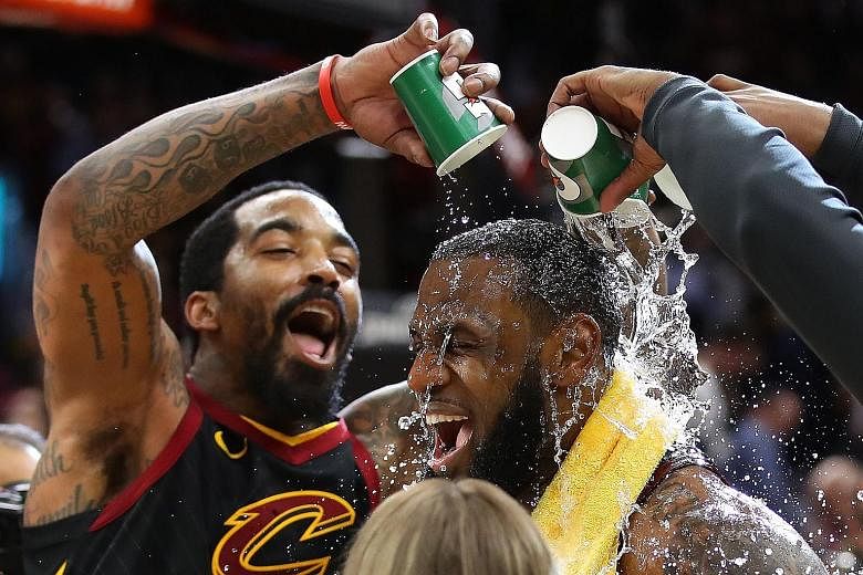 J. R. Smith showers Cleveland team-mate LeBron James with praise after the latter was instrumental in a last-gasp 98-95 win over Indiana in Game 5 of the play-offs.