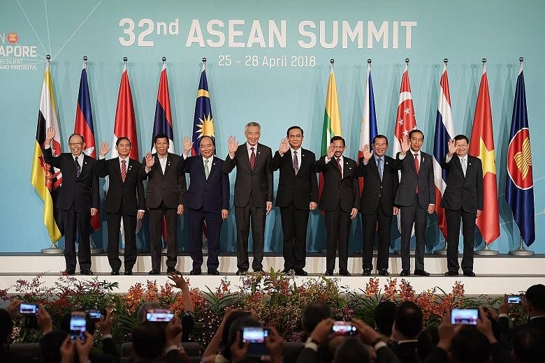Asean leaders at the summit yesterday - (from left) Malaysian Deputy Prime Minister Musa Hitam, Myanmar President U Win Myint, Philippine President Rodrigo Duterte, Vietnamese Prime Minister Nguyen Xuan Phuc, Singapore Prime Minister Lee Hsien Loong,