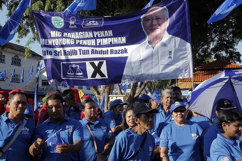 Supporters of Prime Minister Najib Razak in the state of Pahang yesterday where he filed his nomination papers to stand in Pekan.