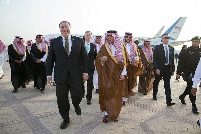 US Secretary of State Mike Pompeo is welcomed by Saudi Arabian Foreign Minister Adel al-Jubeir upon his arrival in Riyadh on Saturday. Mr Pompeo's visit to the Middle East covers Riyadh, Amman and Jerusalem.