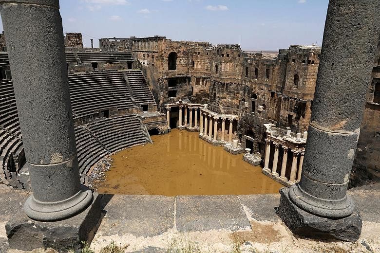The 2nd-century Roman amphitheatre in the historic southern town of Bosra al-Sham, Syria, is partially submerged following heavy rain last week. The raging conflict in Syria has seen the destruction of six Unesco world heritage sites, including the a