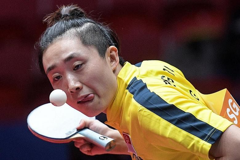 Feng Tianwei lost her opening game to China's two-time world junior champion Wang Manyu but recovered to win the next three games.