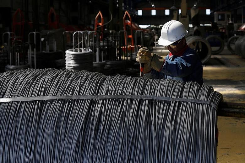 A worker at a stainless steel wire factory in Huamantla, Mexico. In March, US President Donald Trump imposed a 25 per cent tariff on steel imports and a 10 per cent tariff on aluminium, leading to increased friction with the US' trading partners worl