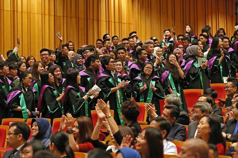 At Republic Polytechnic's 13th graduation ceremony yesterday (main photo), valedictorian Nur Nazurah Abdul Rahim (above) encouraged her peers to pursue their passions tirelessly.