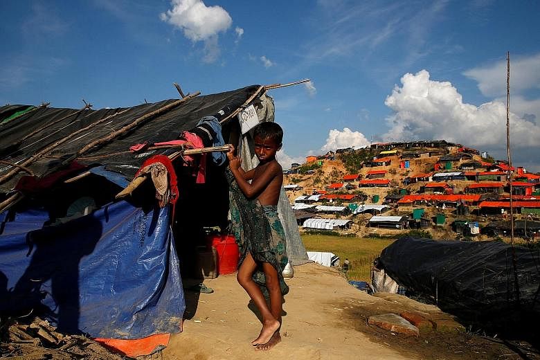 A Rohingya refugee in Palong Khali refugee camp, near Cox's Bazar, Bangladesh. Shelters, temporary housing and other amenities are being prepared for Rohingya who may wish to return to Rakhine. Larger Myanmar businesses have also contributed to infra