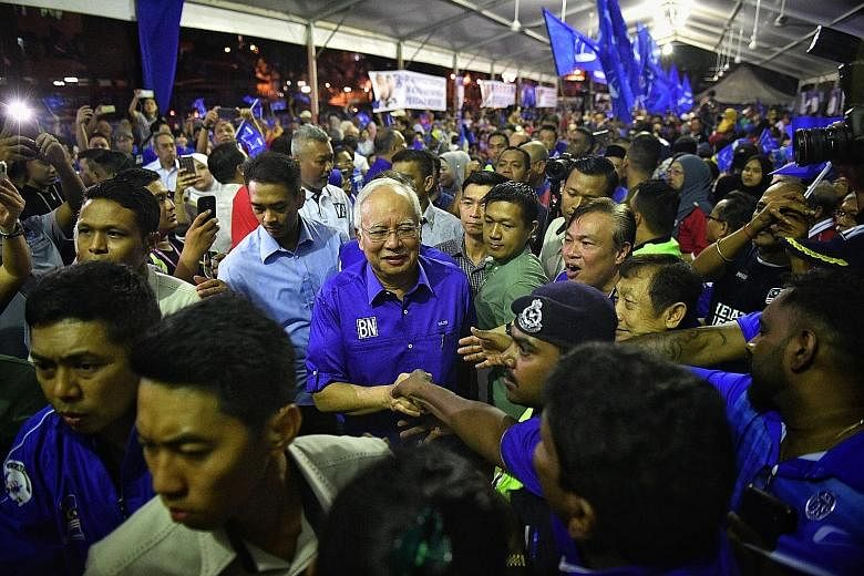 Prime Minister Najib Razak at a rally in Gombak Setia, Kuala Lumpur, last Tuesday. In his campaign appearances, he has focused on reaching out to the party machinery, community leaders and captains of industry.