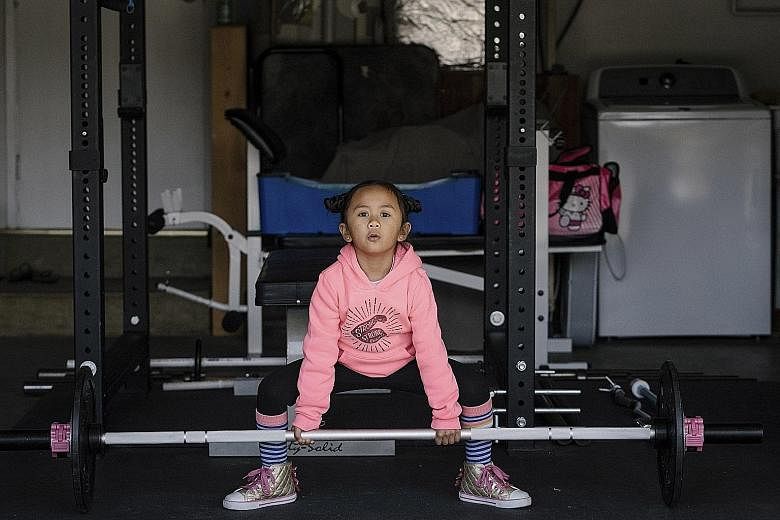 Luma Valones (above), now five, started powerlifting when she was three and 11-year-old Etta Nichols (left) has set 12 new American records in the sport.