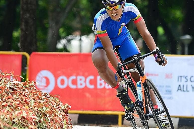 Thant Thiha Dway rounding a corner in the OCBC Cycle Speedway South-east Asia Championship yesterday. Myanmar were only the fourth quickest team but won as the Philippines, Thailand and Singapore all incurred infringements.