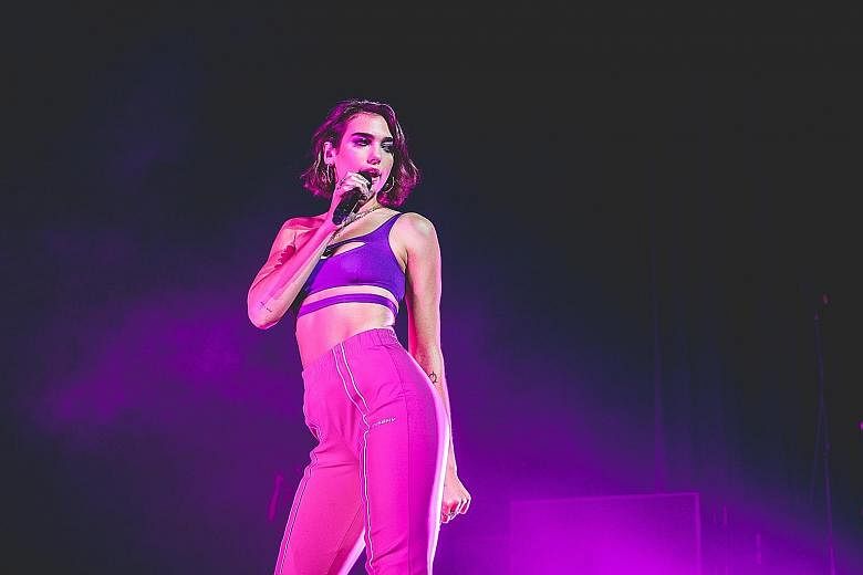 British singer Dua Lipa had a sold-out crowd at her first full-fledged concert in Singapore last Friday (above).