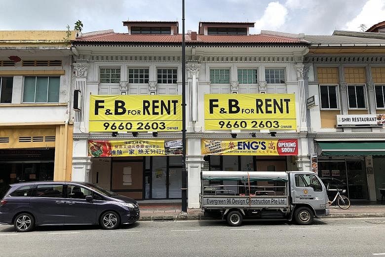 A new lease has been signed on 287 Tanjong Katong Road (left), which is now known as Eng's Wantan Noodle. Meanwhile, Mr Desmond Ng and his sisters have set up a rival shop at 248/250 Tanjong Katong Road (right) called Eng's Char Siew Wantan Mee, whic