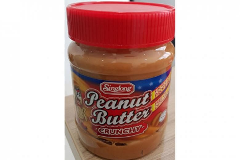 After a metal screw was found in a bottle of peanut butter, the importer recalled the batch as a precautionary measure.