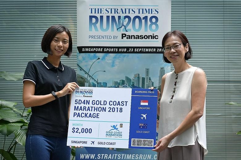ST Run contest winner Shirlene Poon (far left) with Tourism & Events Queensland's international director Lim Mui Khim yesterday. Poon won a 5D/4N trip to this year's Gold Coast Marathon, which will take place along the breathtaking beaches of Surfers