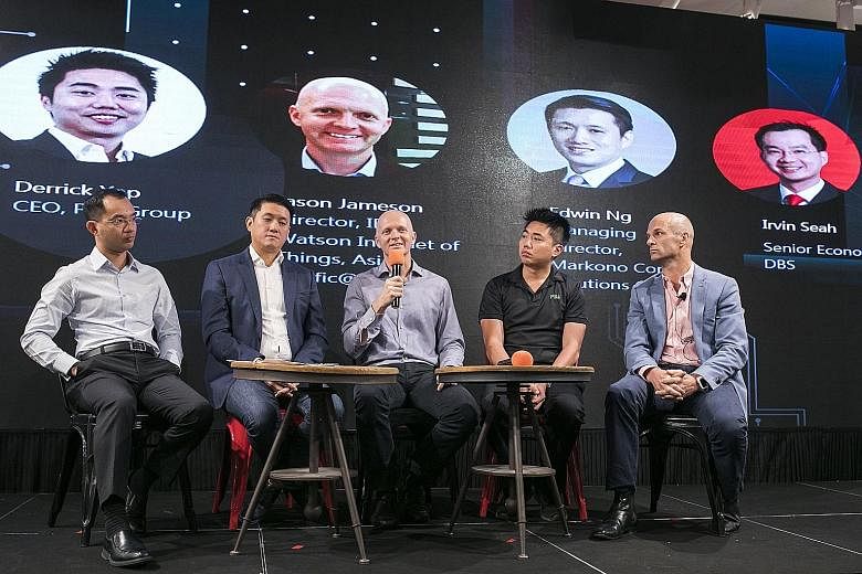 On The Future of Electronics panel yesterday were (from left) Mr Irvin Seah, senior economist at DBS; Mr Edwin Ng, managing director of Markono Content Solutions Group; Mr Jason Jameson, director, IBM Watson Internet of Things, Asia Pacific@IBM; Mr D