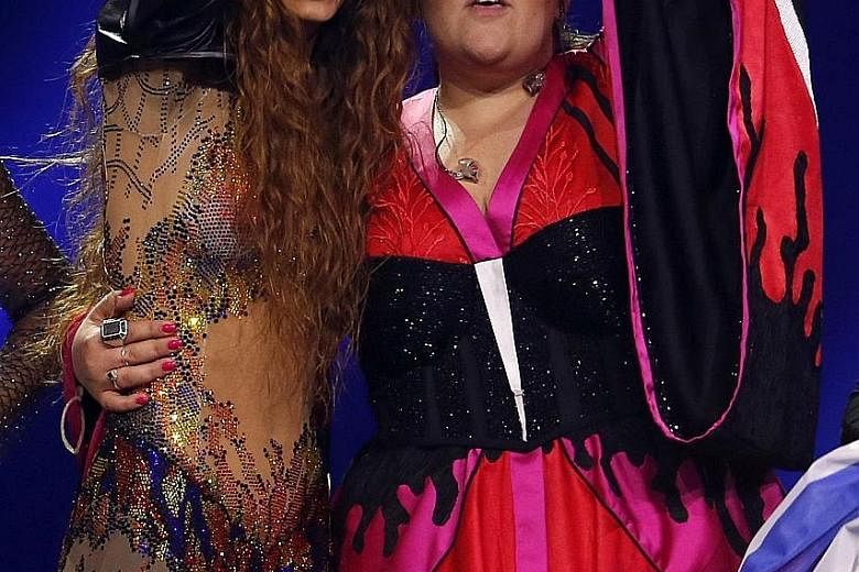 Cyprus' Eleni Foureira (left) and Israel's Netta Barzilai (right) at the first semi-finals of this year's Eurovision Song Contest at the Altice Arena in Lisbon.