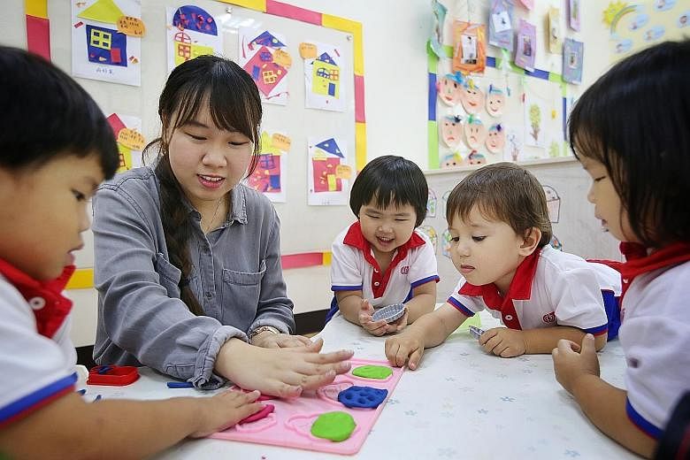 Ngee Ann Polytechnic early childhood education student Jessie Too, 20, having an interactive lesson with children. The new diploma will have a curated set of core modules and a strong focus on practice-based learning.