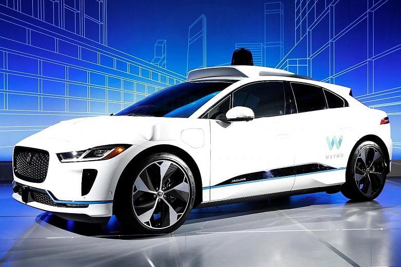 A Jaguar I-Pace self-driving car at its unveiling by Waymo in New York.