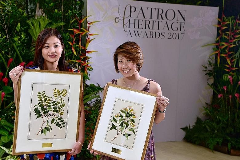 Patrons, such as Ms Mavis Toh (far left) of Lee Hwa Jewellery and Ms Esther Loo of Tai Sun (Lim Kee) Food Industries, were given reproductions of watercolour drawings from the National Museum's William Farquhar Collection of Natural History Drawings.