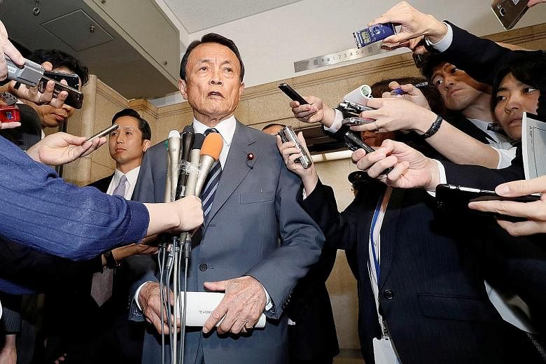 Mr Taro Aso's remarks last week sparked small-scale protests in cities from Sapporo to Kyoto.
