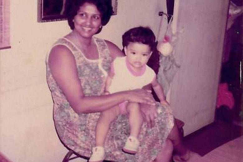 Ms Tiyu as a child in the lap of her mother, Madam Peri Pillai, a nurse. Her sudden death at home affected her deeply.
