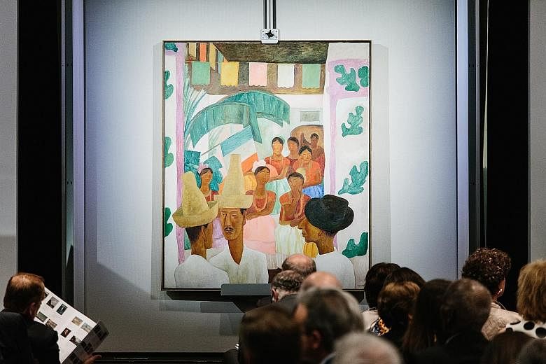 Up for auction were treasures that included furniture and porcelain (above) and paintings such as Diego Rivera's "Los Rivales" (left). Although the sale did not cross the US$1 billion threshold as speculated, it did break numerous records.