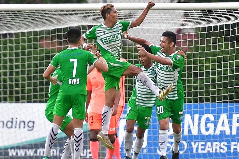 Geylang International's Shawal Anuar celebrating after heading in his second goal in their Singapore Premier League match at Hougang Stadium yesterday. Geylang beat Hougang 3-1.