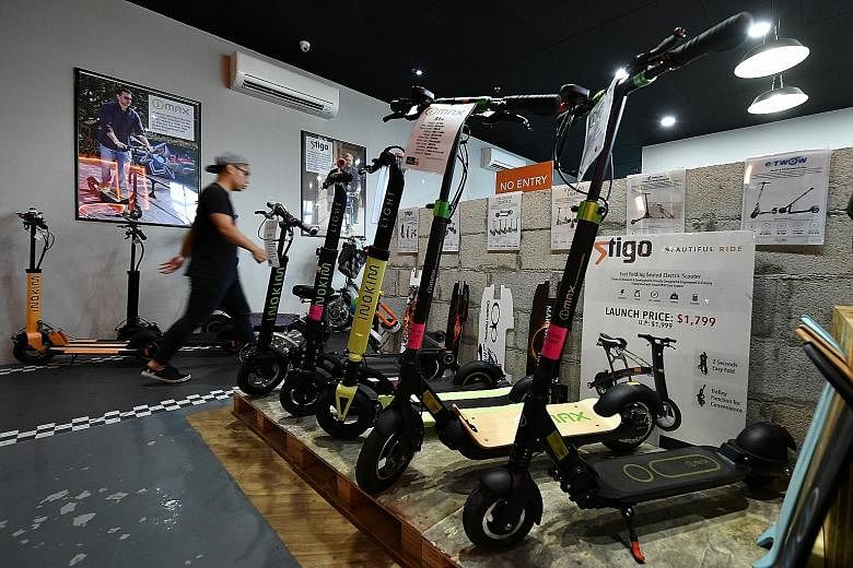 Electric scooters for sale at Falcon PEV. Its general manager Victor Lee said PMD sales have slowed by about 20 per cent, starting from a year ago, and attributed this partly to more retailers entering the market, along with news of the Active Mobili