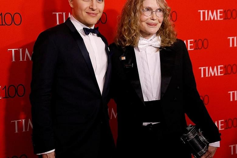 Ronan Farrow is the only biological child of actress-activist Mia Farrow (both left) and film director Woody Allen.