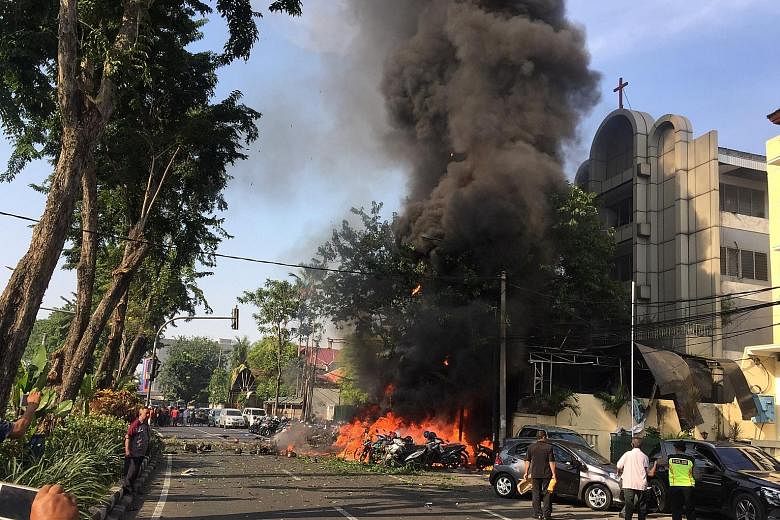 The scene following one of the suicide attacks at the Surabaya Centre Pentecostal Church, in this photo provided by Antara Foto. Police said the attackers comprised a husband and wife, their two sons aged 15 and 17, and two daughters aged nine and 12
