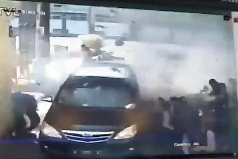 Stills from CCTV footage showed people on motorcycles detonating bombs at the gate of the Surabaya police station yesterday. The blast left 10 people injured. The father from the family that struck the police station was from the same terror cell as 
