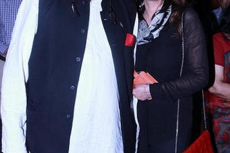 Shashi Tharoor and Sunanda Pushkar in earlier days, attending a special screening of Bollywood movie Lootera at the Film Division Auditorium in New Delhi, India, on July 3, 2013.