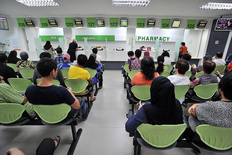 Patients waiting to pick up their medicine at the pharmacy in Tampines Polyclinic. Dr Chia Shi-Lu, who chairs the Government Parliamentary Committee for Health, said most Singaporeans still visit their family doctor or GPs rather than polyclinics for