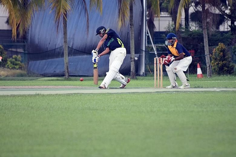 Raffles Institution (RI) captain Mustafa Anis Hussain driving fluently en route to his side's victory in the Schools National A Division cricket final yesterday. RI beat Anglo-Chinese School (Independent) by eight wickets at the Ceylon Sports Club. A