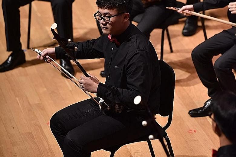 Victoria School student Lu Jietao said it was his school's Chinese Orchestra CCA group that allowed him to learn how to play the erhu. He is one of four Mapletree-TENG Academy scholarship holders who begin a two-year scholarship programme, valued at 
