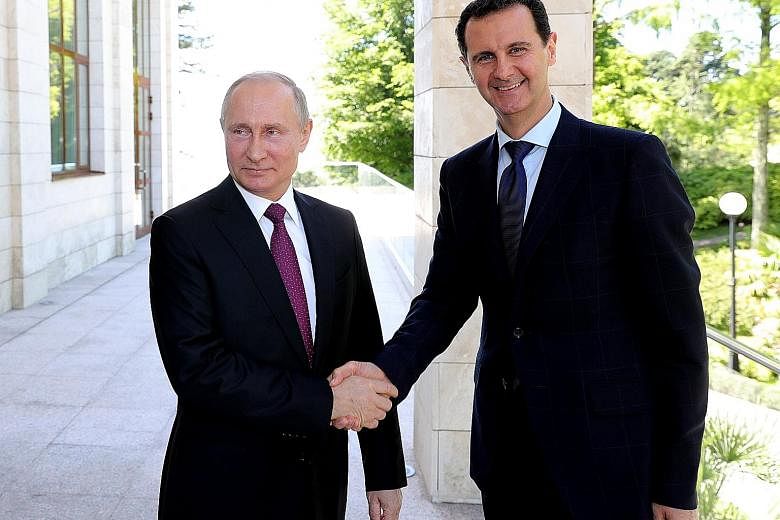 Russian President Vladimir Putin (left) meeting his Syrian counterpart Bashar al-Assad in the southern Russian city of Sochi on Thursday, after a UN envoy warned that the regime's assault on the rebel-held area of Idlib could affect 2.3 million peopl
